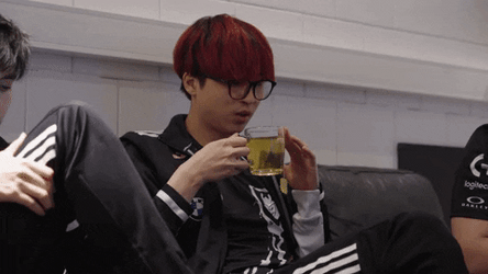 Red Haired Boy Sipping Tea GIF