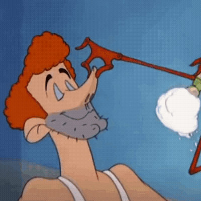 Red-Haired Cartoon Character Holding Red Object In Mouth GIF