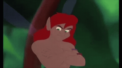 Red-Haired Cartoon Character With Wings Standing Next To Tree GIF