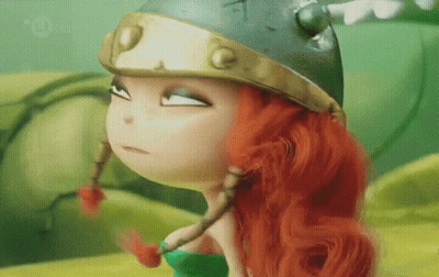 Red-Haired Doll In Helmet And Green Top GIF
