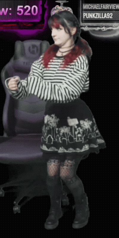 Red-Haired Girl Dancing By Purple Chair 520 GIF