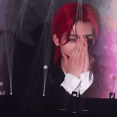 Red-Haired Man Covering Face At Piano GIF