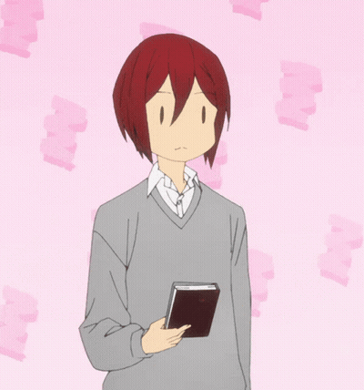Red-Haired Man Holding Book GIF