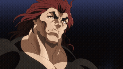 Red-Haired Man In Black Shirt Looking Down GIF