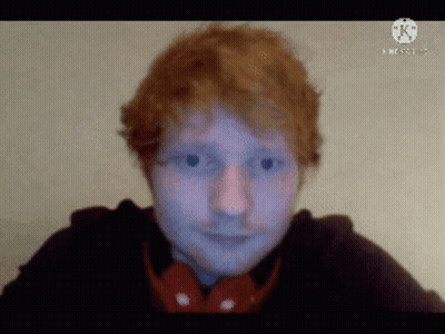Red-Haired Man In Headphones And Black Shirt GIF