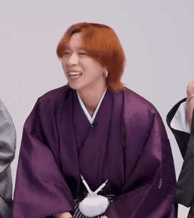 Red-Haired Man In Purple Kimono Smiling GIF