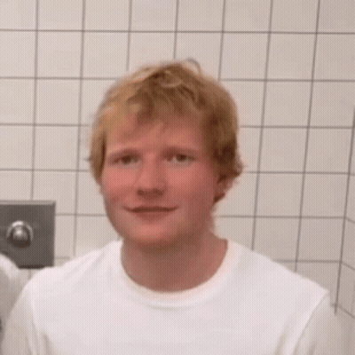 Red-Haired Man In White Shirt Bathroom Mouth Open GIF