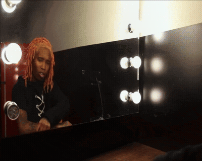 Red-Haired Man Looking In Mirror GIF