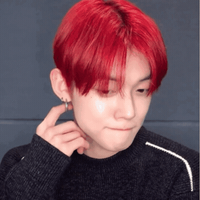 Red-Haired Man With Earrings And Black Sweater GIF