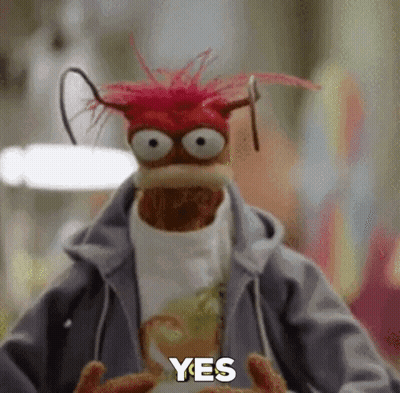 Red Haired Stuffed Animal Wearing Hoodie And Yes Shirt GIF