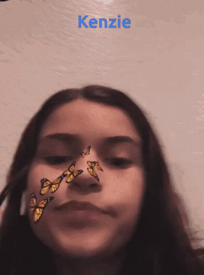 Red-Haired Stuffed Animal With Blue Eyes Fire GIF