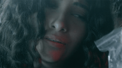 Red-Haired Woman Covering Face GIF