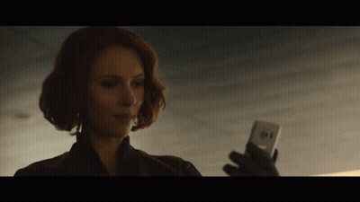 Red Haired Woman Holding Cell Phone GIF