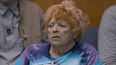 Red-Haired Woman In Blue Purple Tie Dye Sweater GIF