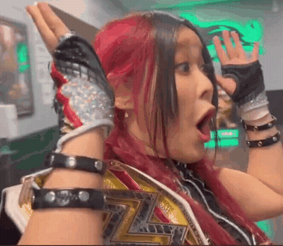 Red-Haired Woman In Wrestling Belt And Gloves Funny Face GIF
