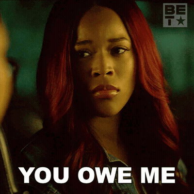 Red-Haired Woman Tells Man You Owe Me GIF