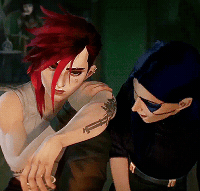 Red-Haired Woman With Tattoo A GIF