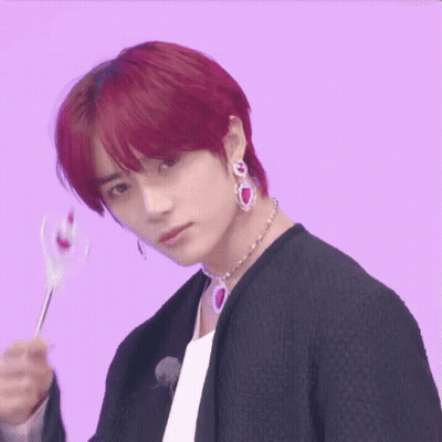 Red-Haired Young Man With Choker And Earrings GIF