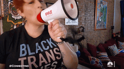 Red Head Woman Shouts On Megaphone GIF