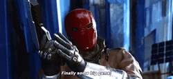 Red Hood Cocking A Gun Battle Ready GIF