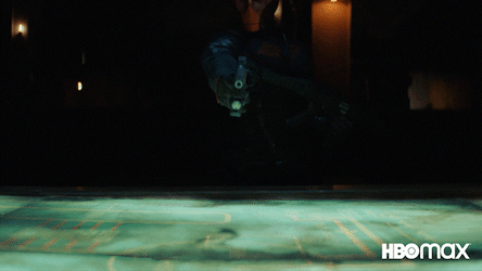 Red Hood Comic Character Peeking In Darkness GIF