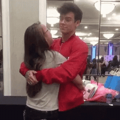 Red Jacket Man Peeking What Are You Doing Here GIF