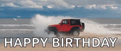 Red Jeep Driving On Beach Saying Happy Birthday GIF
