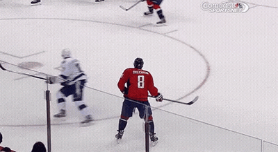 Red Jersey Hockey Player Number 2 Skating GIF