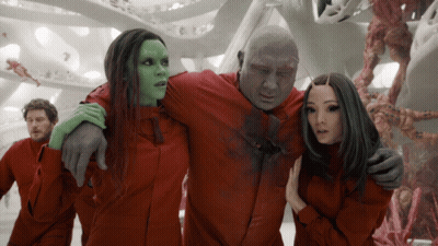 Red Jumpsuit People Standing GIF