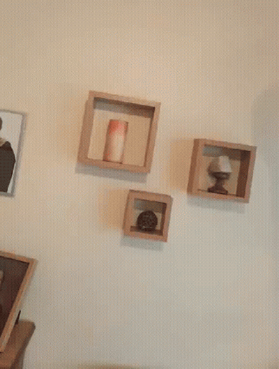 Red Letter L Hanging Next to Picture
