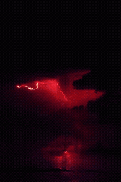 Red Lightning Bolt In Dark Sky GIF
