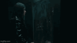Red Lightning When Woman Touch Mirror GIF