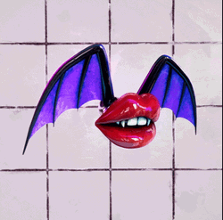 Red Lips With Violet Wings GIF