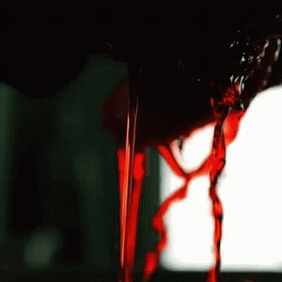 Red Liquid Pouring Into Glass GIF