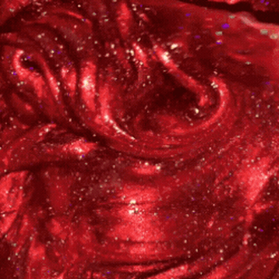Red Liquid Stirred With Spatula