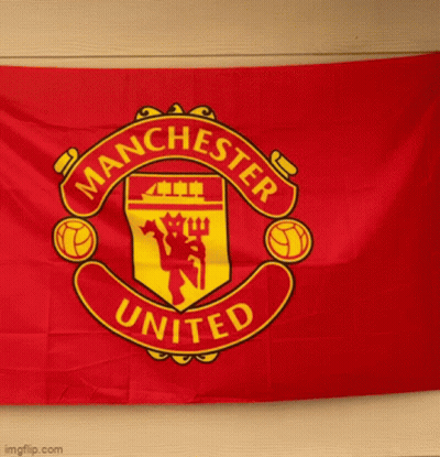 Red Manchester United Flag Hanging On Wall GIF