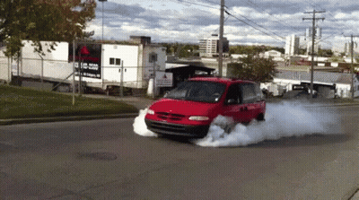 Red Minivan Driving With Smoke From Tires GIF