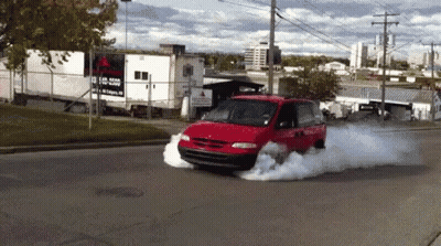 Red Minivan Emitting Smoke GIF