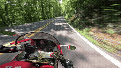 Red Motorcycle Driving Down Road GIF