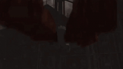 Red Object On A Pole In Front Of Cloudy Sky GIF
