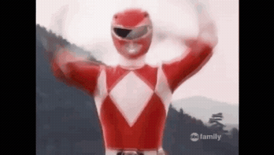 Red Power Ranger Arms Outstretched In Front Of Mountain GIF