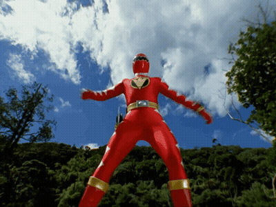 Red Power Ranger In Front Of Blue Sky GIF