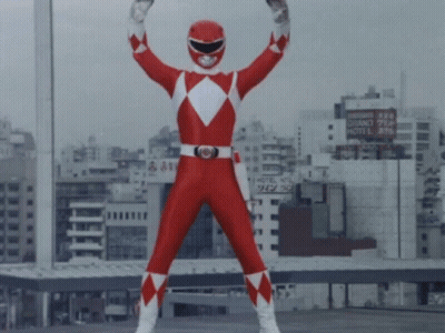 Red Power Ranger Standing In City GIF