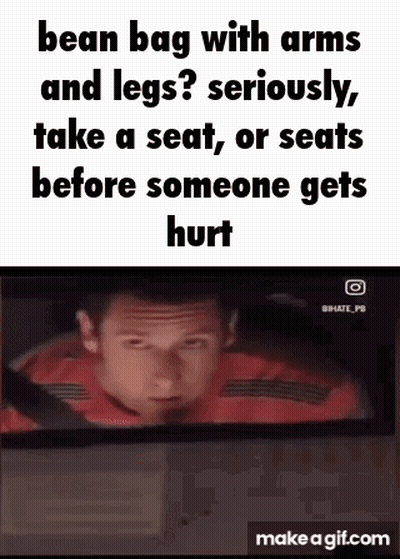 Red Shirt Man In Car With Bean Bag Creature GIF