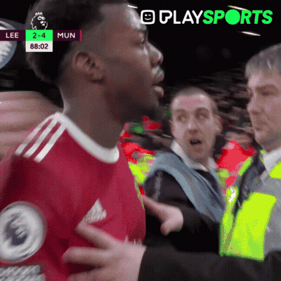 Red Shirt Man Talking Yellow Vest Man Soccer GIF
