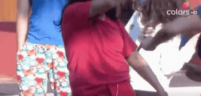 Red Shirt Woman Next To Blue Shirt Man GIF