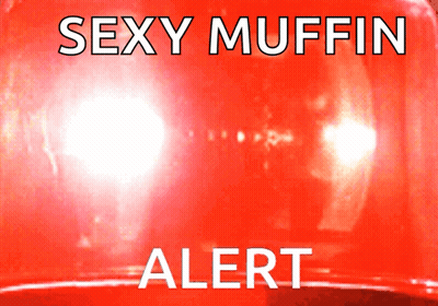 Red Sign Saying Sexy Muffin Alert Lit Up GIF