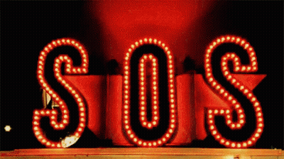 Red SOS Sign Lit Up GIF