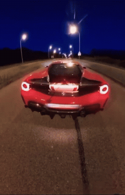 Red Sports Car Driving At Night GIF