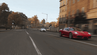 Red Sports Car Driving Next To White Sports Car GIF